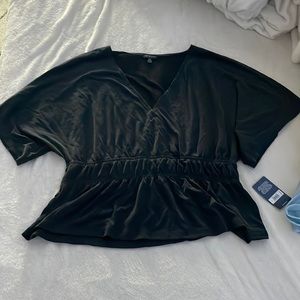 black dressy tshirt. NEVER WORN WITH TAGS!!